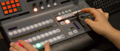 Hands controlling a console