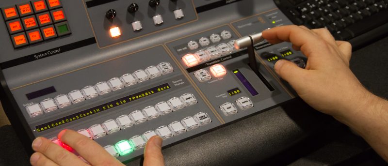 Hands controlling a console