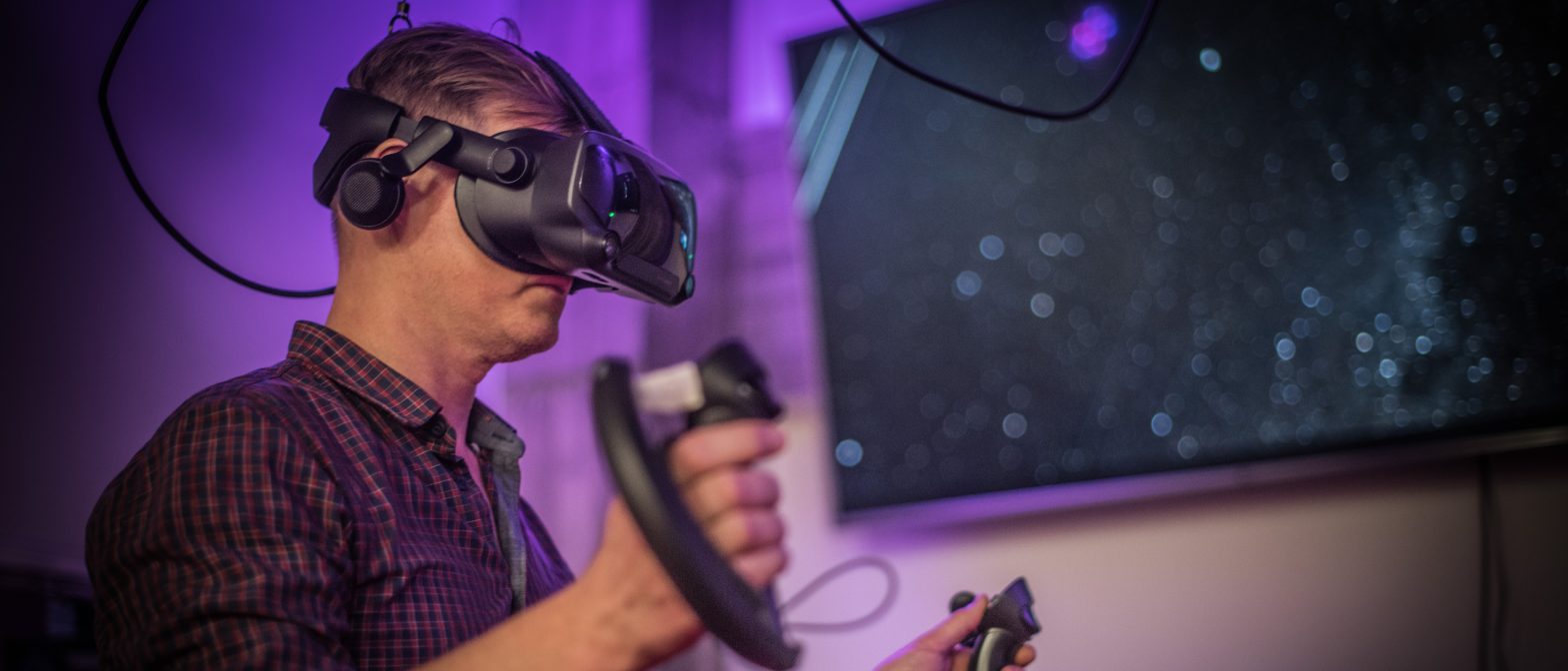Person using headset in VR Hub